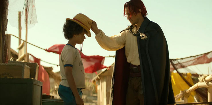 原作名場面之一：紅髮傑克為幼年魯夫戴上草帽