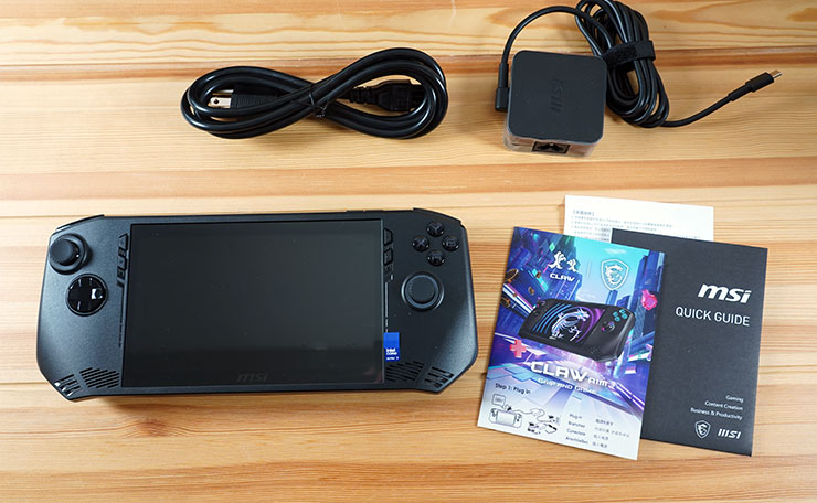 盒內物品一覽：MSI Claw 主機、充電器 / 電源線、使用說明手冊