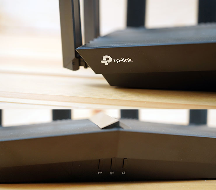 機身前側左方可以看到 TP-Link 的 LOGO，中間偏底側設置了三個按鈕。