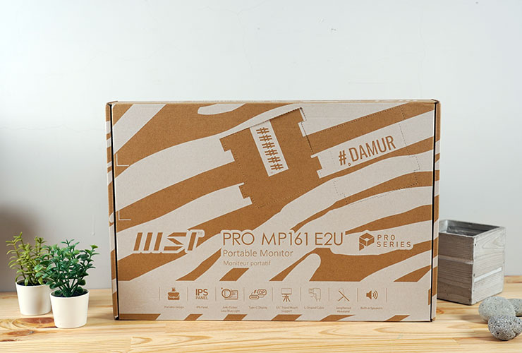 8/1 新發售的 MSI PRO MP161 E2U，外盒包裝與時尚品牌 #DAMUR 聯名，且融入了環保再生與藝術創作的元素。